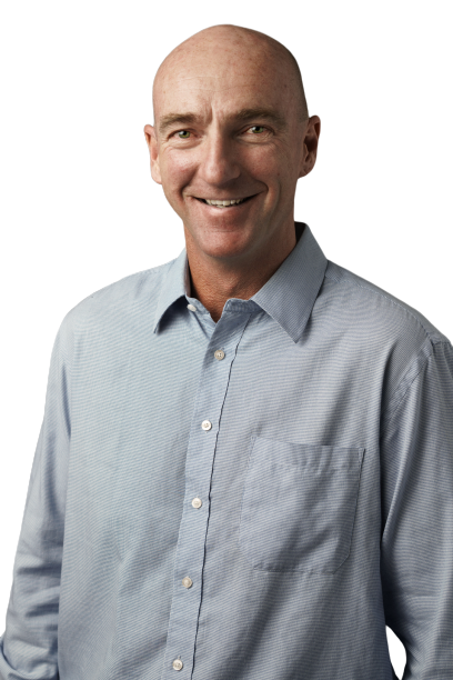 Brendon Harbert, smiling, in a light blue shirt
